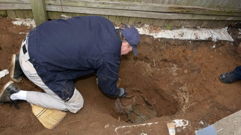 The forensic excavation in 2019 of the grave in Richmond...