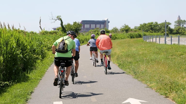 Cyclists ride along the Jones Beach Bikeway in Wantagh.