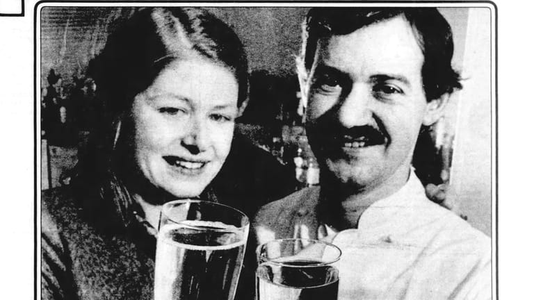 1984: Chef Guy Reuge and his wife Maria toast the...