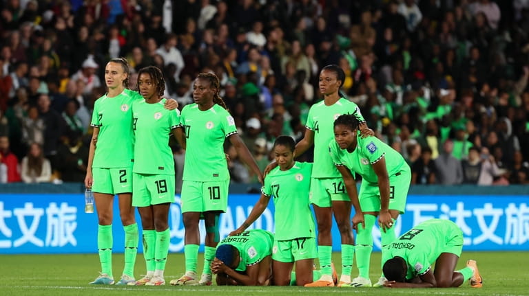 Nigeria's players react during a penalty shootout during the Women's...