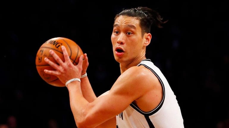 Jeremy Lin #7 of the Brooklyn Nets contols the ball...