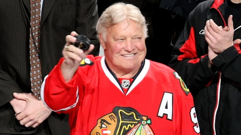 Bobby Hull walks out to drop the puck for the...