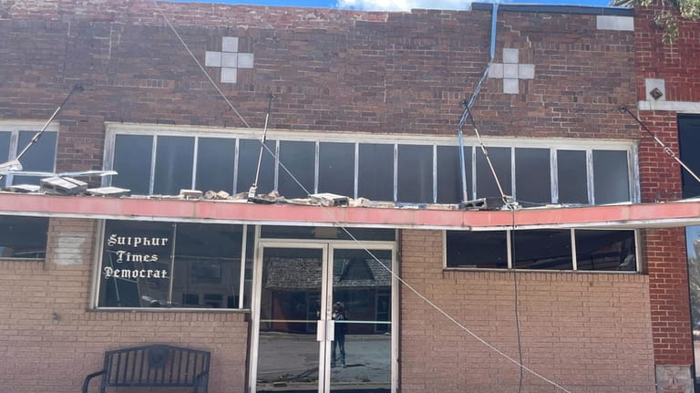 Damage surrounds the Sulphur Times-Democrat building on Monday, April 29,...