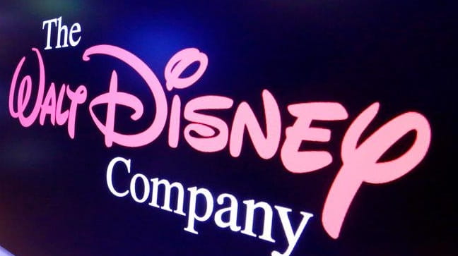 The Walt Disney Co. logo appears on a screen above...