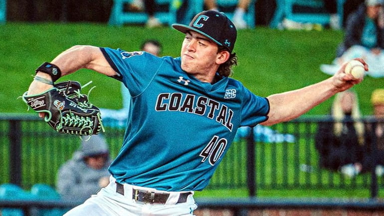 Dominick Carbone of Rocky Point pitches for Coastal Carolina against...