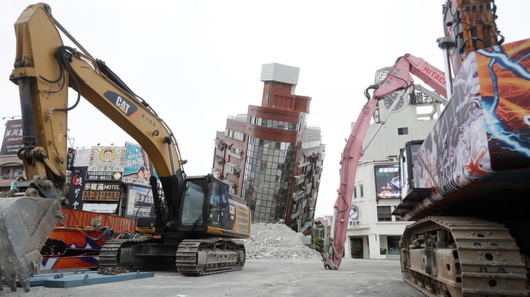 A building is seen partially collapsed, two days after a...