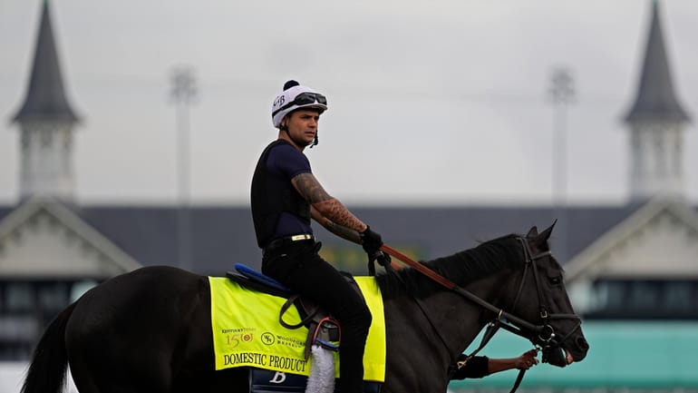 Kentucky Derby hopeful Domestic Product waits to work out at...