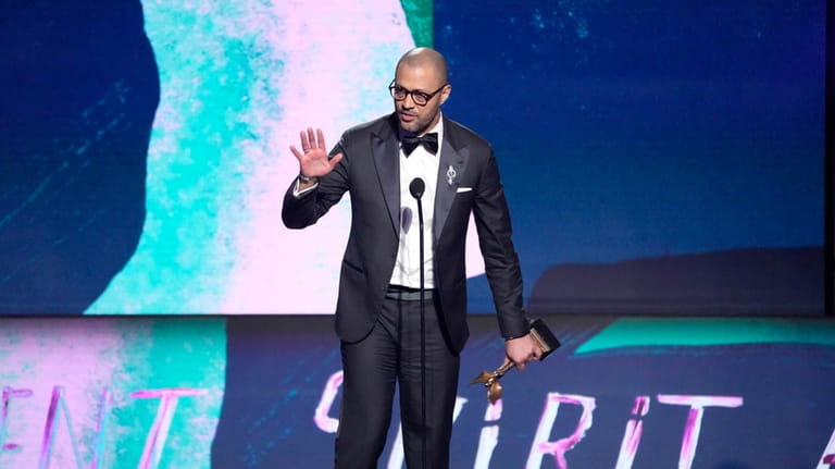 Cord Jefferson accepts the award for best screenplay for "American...