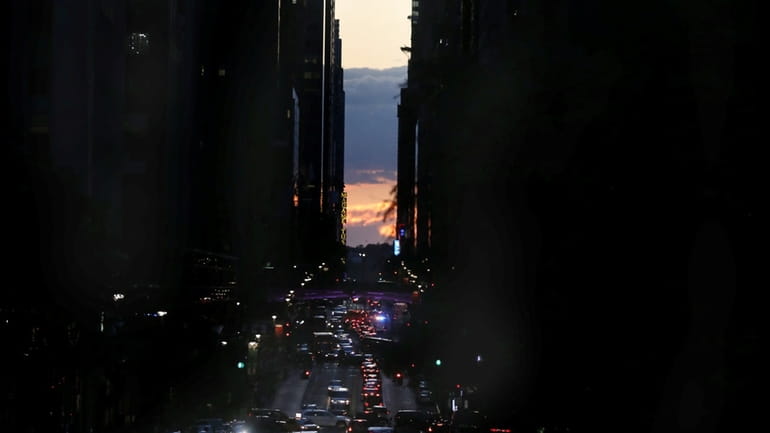 Manhattanhenge occurs when the setting sun aligns with Manhattan’s street...