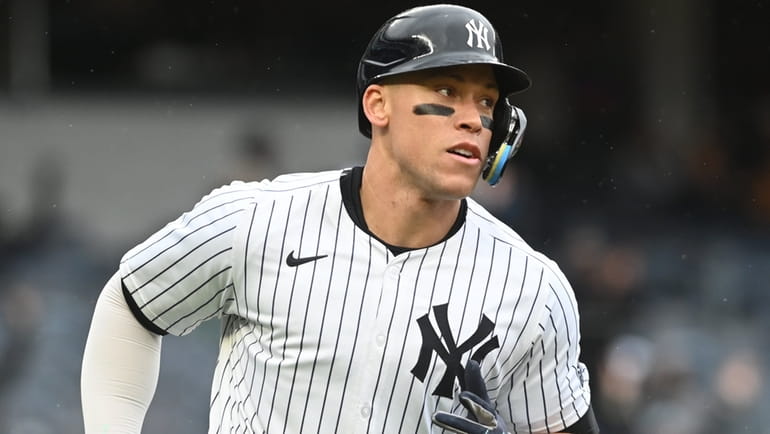Aaron Judge #99, New York Yankees centerfielder, rounds the bases...