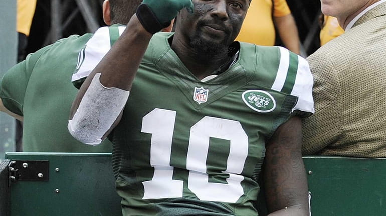 SANTONIO HOLMES | Jets, wide receiver Holmes reportedly suffered a...