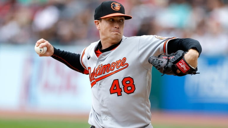 Baltimore Orioles starting pitcher Kyle Gibson delivers against the Cleveland...