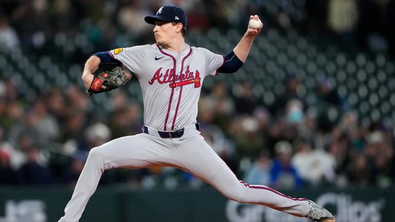 Atlanta Braves starting pitcher Max Fried throws against the Seattle...
