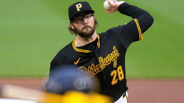 Pittsburgh Pirates starting pitcher Josh Fleming delivers during the first...