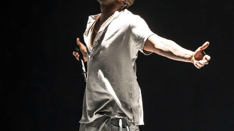 Kanye West performs on his Yeezus tour, which stopped by...