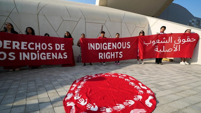 Activists demonstrate for Indigenous rights at the COP28 U.N. Climate...