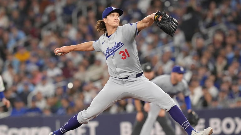Los Angeles Dodgers pitcher Tyler Glasnow (31) throws during the...