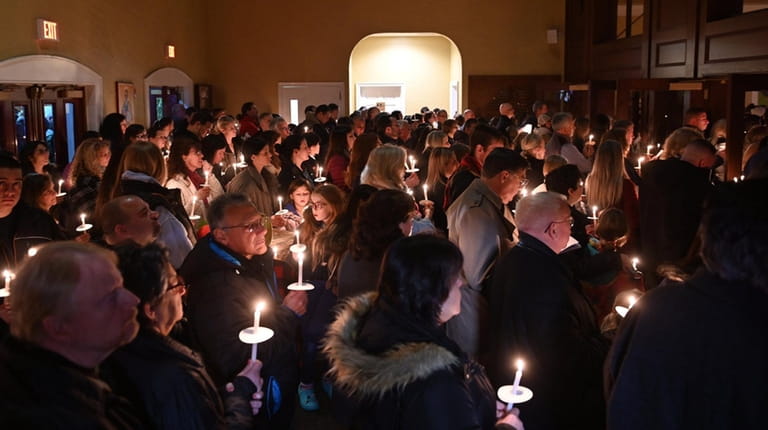 A candlelight vigil was held for Thomas Valva at St. John...