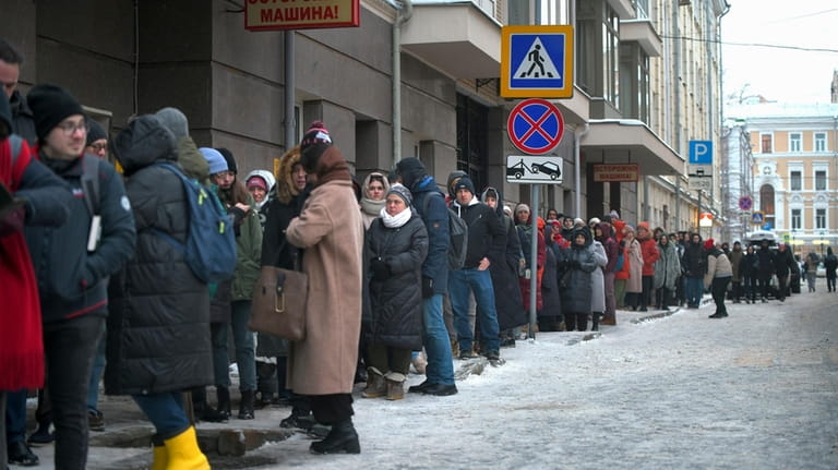 People line up in Moscow, Russia, on Saturday, Jan. 20,...