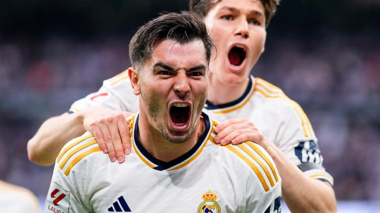 Real Madrid's Brahim Diaz celebrates after scoring his side's opening...