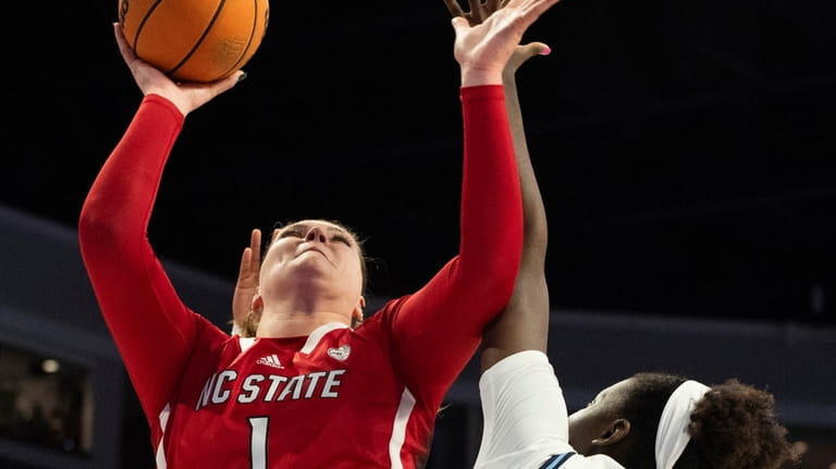 North Carolina State center River Baldwin (1) shoots against Old...