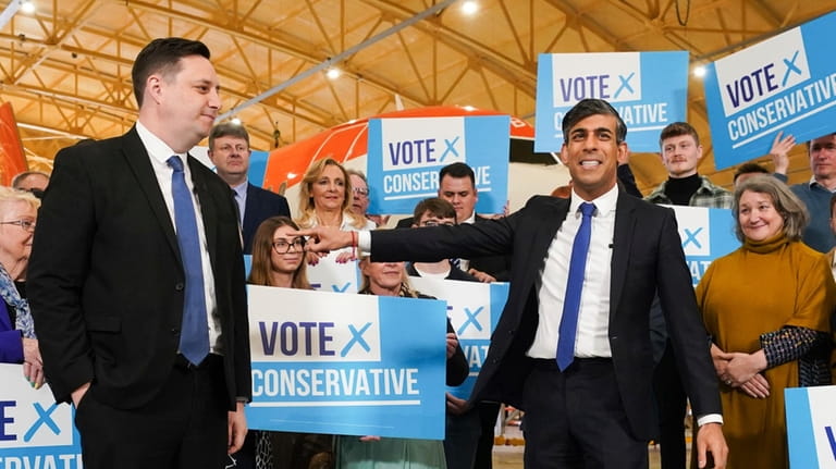Conservative party candidate Lord Ben Houchen, left, with Britain's Prime...