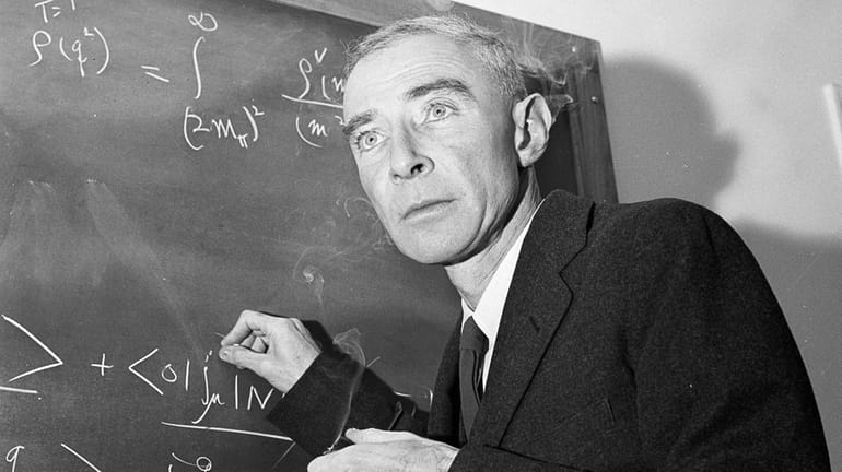 J. Robert Oppenheimer, creator of the atomic bomb, is seen at his...