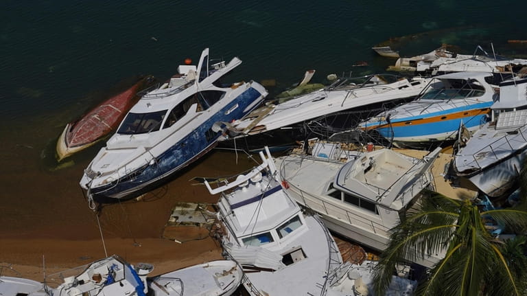 Boats lay in ruins after the passing of Hurricane Otis...