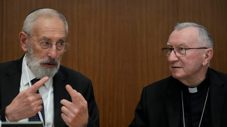 Rome's Chief Rabbi Riccardo Di Segni, left, talks to Vatican...