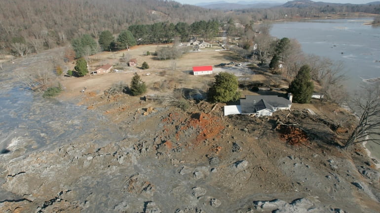 Homes that were destroyed by coal ash when a retention...