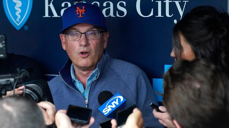 Mets owner Steve Cohen talks to the media in the...