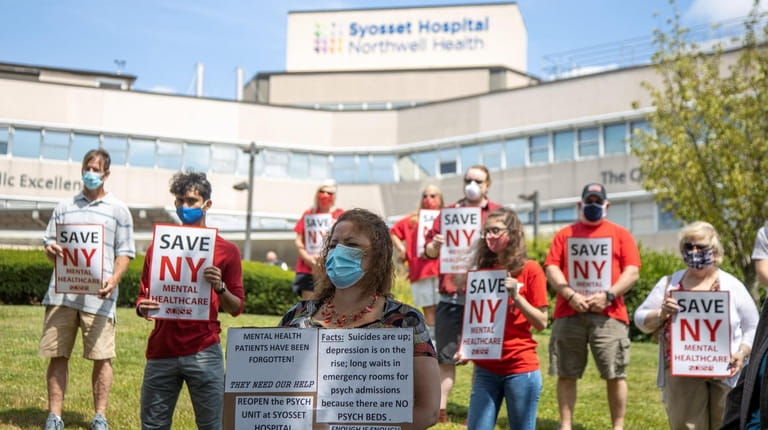 Nurses and community leaders called for the reopening of Syosset...