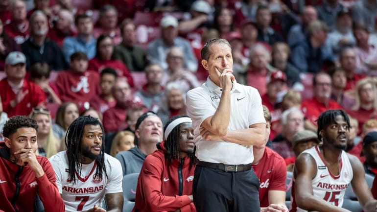 Arkansas head coach Eric Musselman looks on during the first...
