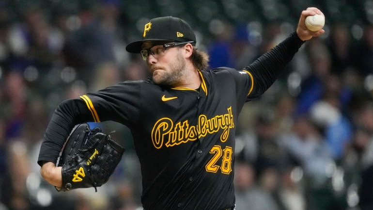 Pittsburgh Pirates pitcher Josh Fleming throws during the seventh inning...