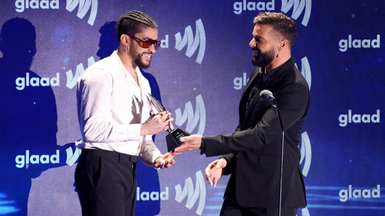 Reggaeton artist Bad Bunny is presented with a GLAAD Media...