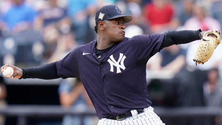 New York Yankees starting pitcher Luis Severino throws during the...