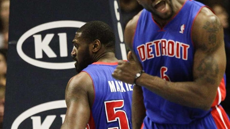 Detroit Pistons center Ben Wallace (6) reacts to a slam...