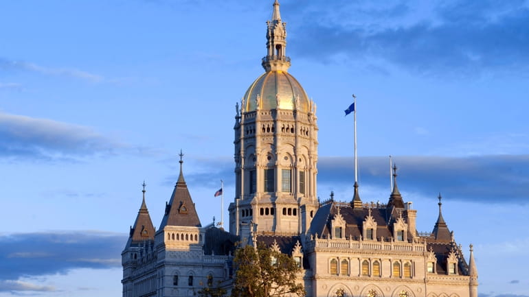 The Connecticut State Capitol building is seen in Hartford, Conn.,...
