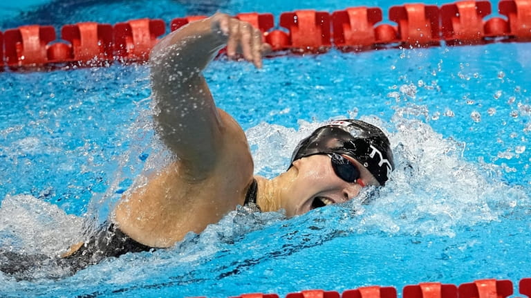 Katie Ledecky competes in the women's 800-meter freestroke final at...