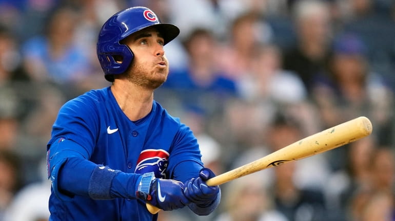Chicago Cubs' Cody Bellinger watches his home run during the...