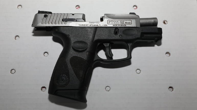One of the weapons recovered at Saturday night's shooting in...