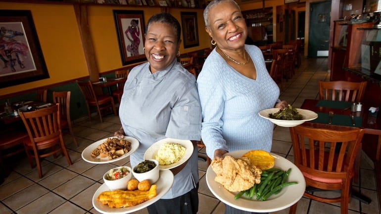 Leisa Dent, with her mother, Lillian, hold signature dishes at...