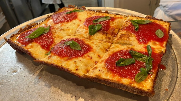Deep dish Detroit-style pizza at Tori T's in Malverne is...