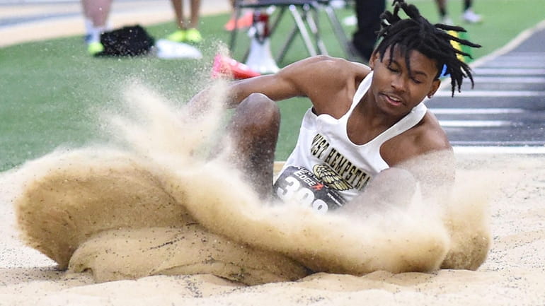 Jurrel Hall of West Hempstead competes in the boys triple...