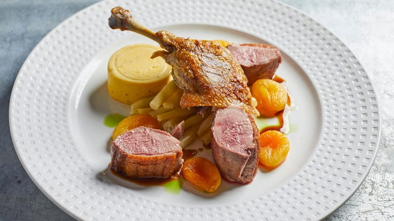 Roasted duck leg with carrot flan, yellow wax beans and apricots...
