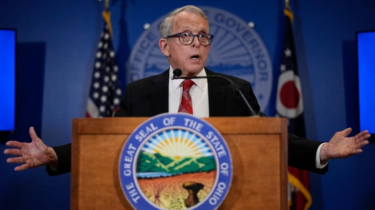 Ohio Gov. Mike DeWine speaks during a news conference, Friday,...