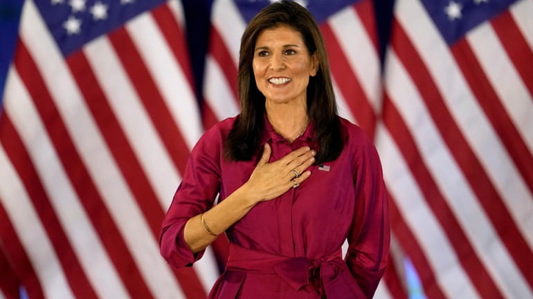 Republican presidential candidate former UN Ambassador Nikki Haley gestures to...