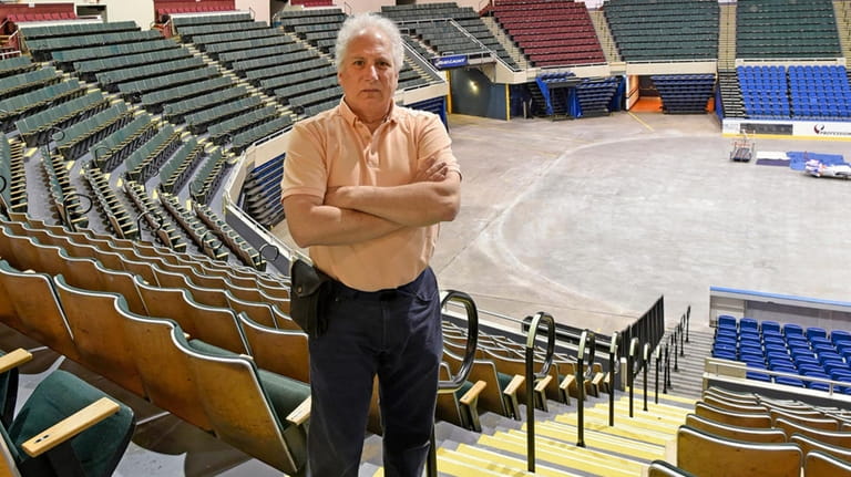 Dave Pokress stands in the spot at Nassau Coliseum where...
