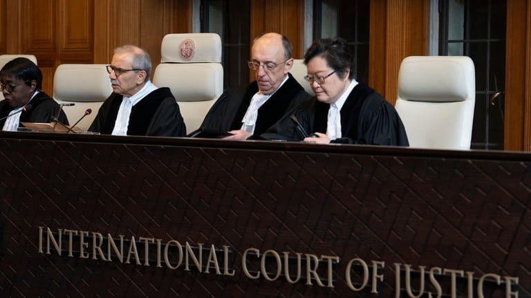 Judge Nawaf Salam, second left, presides at the International Court...