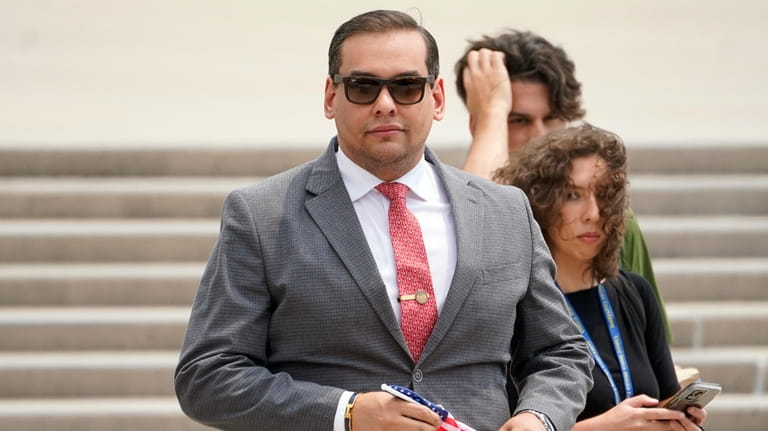 Rep. George Santos leaves federal court in Central Islip on June...